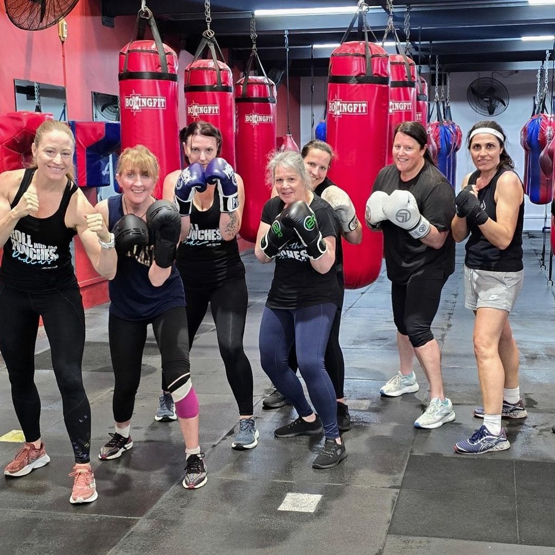 Ladies class posing in fight stance